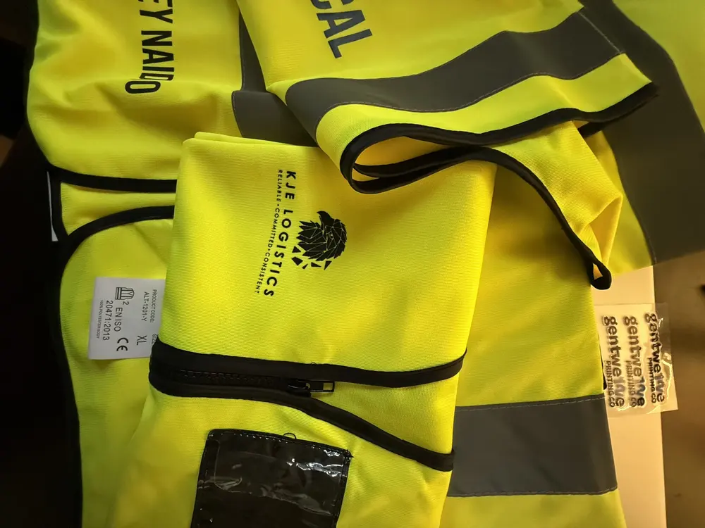 Hi-viz vests printed with a client's logo
