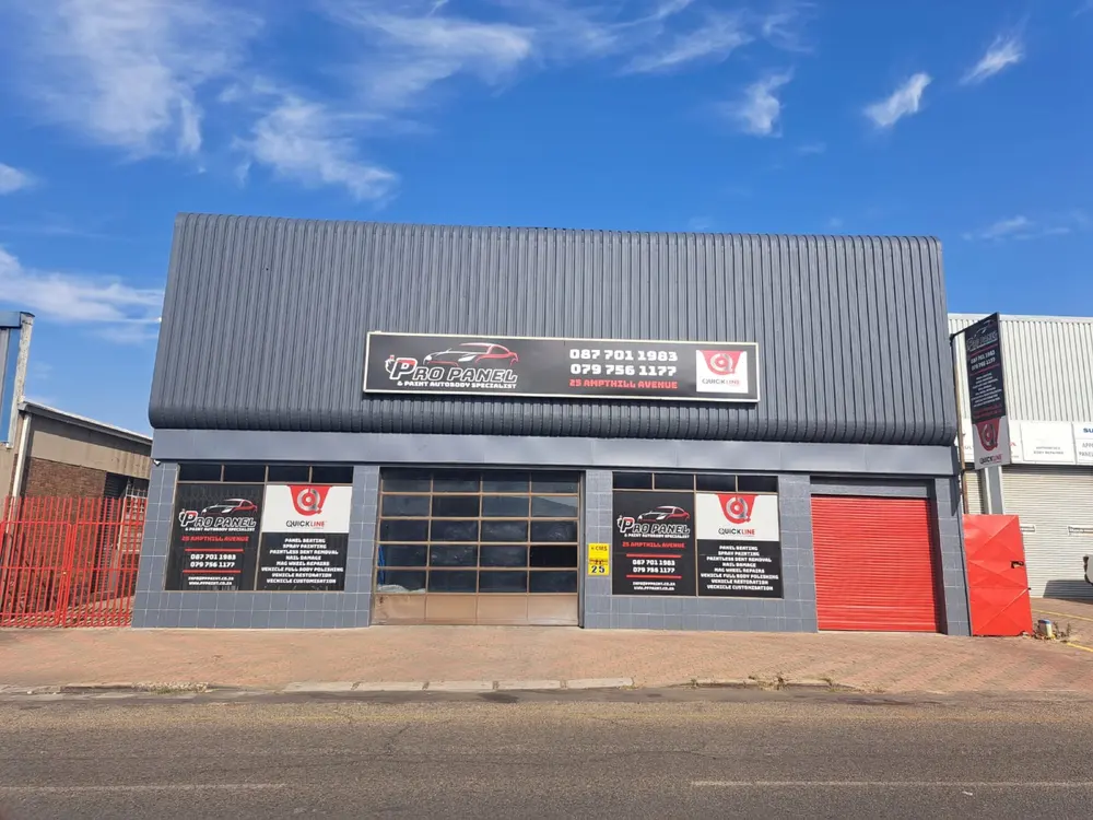 Signage and window graphics on a client's workshop front